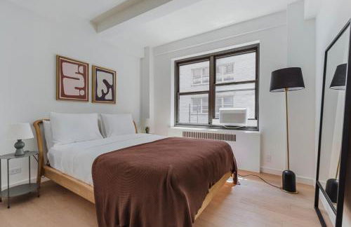 Blueground Midtown E wd doorman nr E River NYC-1527 - Photo 11