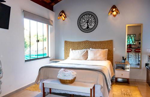 Chalé Canto do Galo 1 - Hidro da Jacuzzi, Lareira Ecológica, Cozinha Completa, Wi-Fi 80mbps, próximo a comércio local e relaxando ao som do riacho - Photo 8