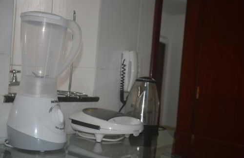 Dois quartos Cozinha completa Wi Fi Self check in com senha Central e perto de tudo a 4,4Km da Rodoviária e 15,4 km do Aeroporto Apartamentos 102 e 302 - Foto 29