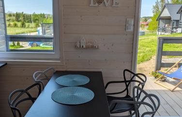 WIDOKI Rusinowo Domki Letniskowe - Foto 46