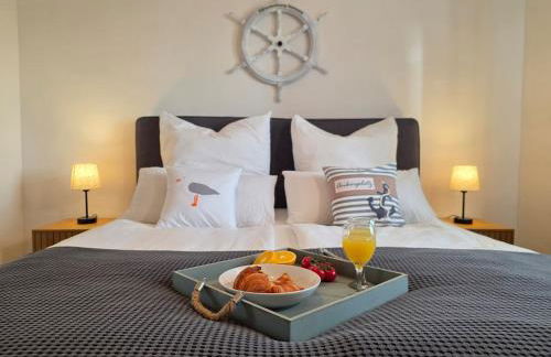 Seensucht - Maritimes Apartment mit Seeblick & Balkon, 500 m zum See - Photo 15