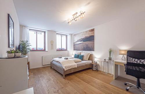 Gemütliche Ferienwohnung mit 2 Schlafzimmern, kostenfreiem Parkplatz, modernem Bad, Küche, Waschmaschine & Trockner - Foto 4