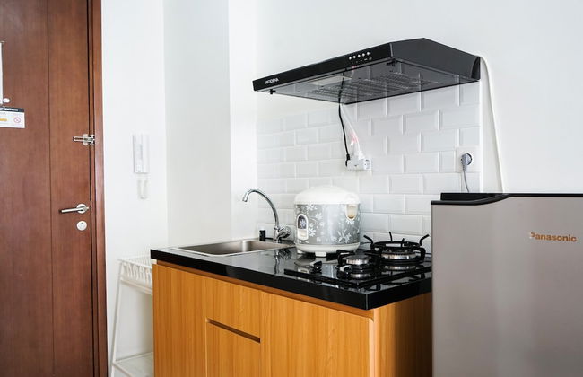 Homey Studio Signature Park Grande Apartment - Photo 9