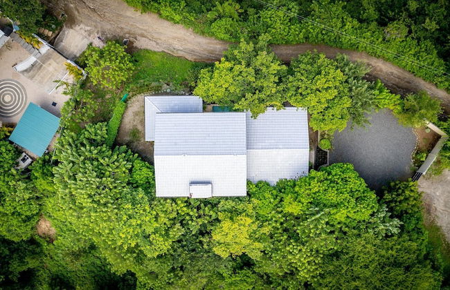 Nostalgic Retro Home on Luxurious Lot with a Private Infinity Pool and Ocean Views - Photo 26