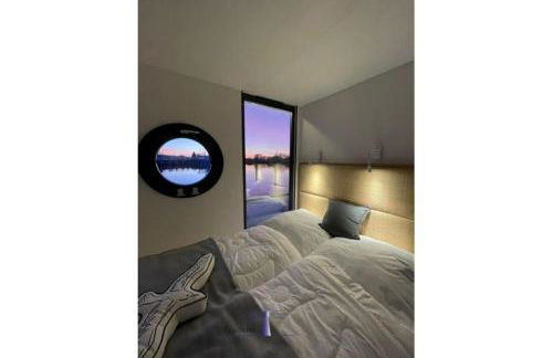 Hausboot Fjord HAVEN mit Biosauna in Barth - Photo 12