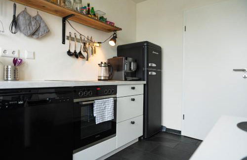 Wölkchen - Wohnung mit Balkon, Holzdielen & TV - Foto 21