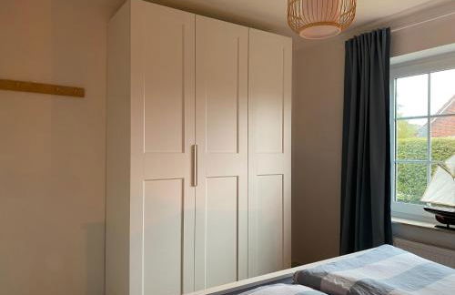 Nessmersiel, Renovierte Erdgeschosswohnung mit Garten, in Deichnähe, Wallbox, - Foto 7