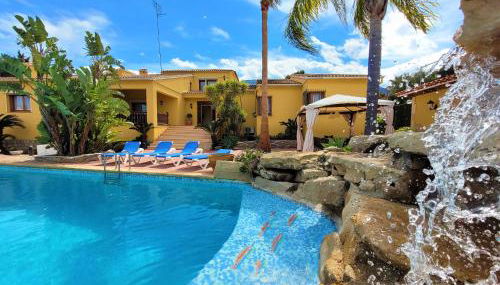 Villa with private pool and tennis court 150 metres from the sea-Villa el Olivo - Photo 3, Garden, sunbed, Garden view