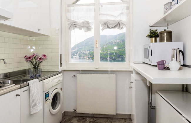 JOIVY Garden Oasis: 1BR Apt w/ Balcony & Parking - Foto 6