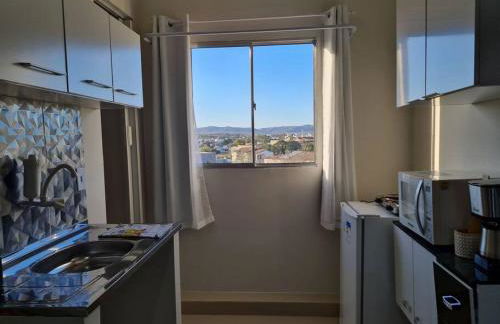 Kitnet404 central, com tv smart,linda vista para janela - Foto 12