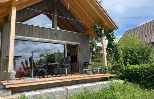 Zweistöckiges Natur-Holzhaus mit Berg- & Seesicht - Foto 22