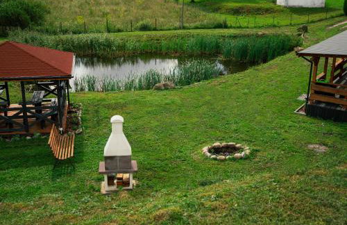 Domek na Mazurach nad stawem z jacuzzi - Photo 2