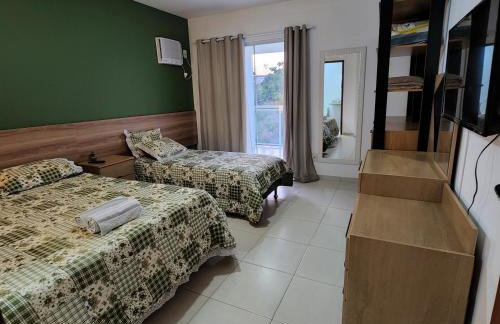 Casa confortável pertinho da praia com garagem e quintal - Foto 10
