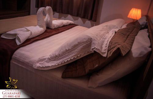 MAIOR NOTA - 2 Quartos com AR CONDICIONADOS SPLIT, Air Fryer, Wi-Fi, Disney Plus, Star Plus, HBO Max, Cadeiras de Praia, Caixa Térmica, Churrasqueira, Rede para Descanso e Chuveirão - 8 pessoas - CONFORTO Máximo - Melhor Localização!! - Photo 3