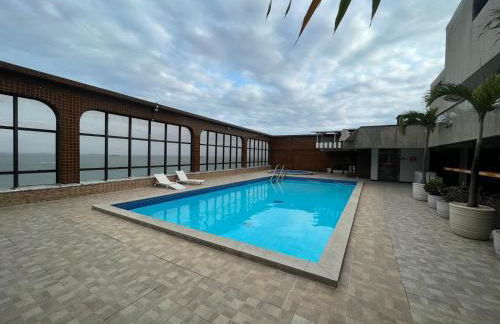 Flats beira mar - praia da costa - Foto 1