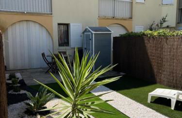 Appartement T2 avec son rez de jardin de 40 m2 5 couchages 250m de la plage et 15km de l'Arena - Foto 2