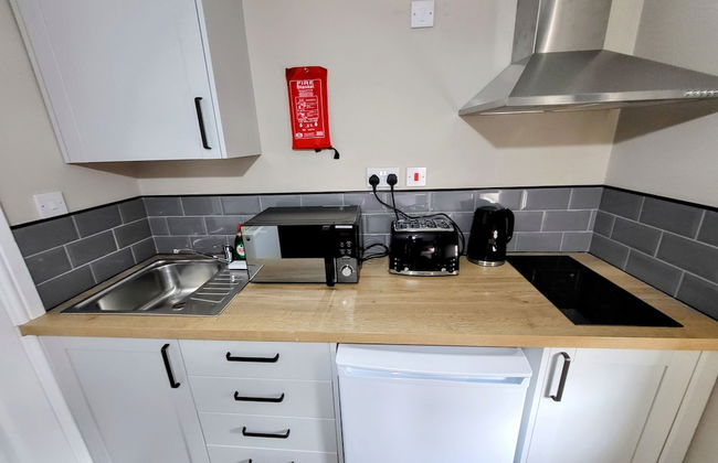 Comfortable Stay - LB Ave - Photo 23