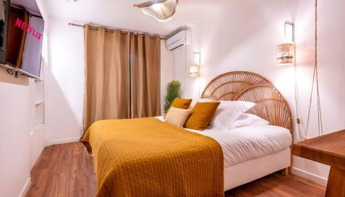 Suite Bali de 45m2 - Idéal couple - Chambre séparée - Jacuzzi baignoire balnéo - Sauna - Clim réversible - Netflix - Piscine accès partagé avec la petite copro - Bouteille de champagne offerte dès 2 nuits - Foto 2