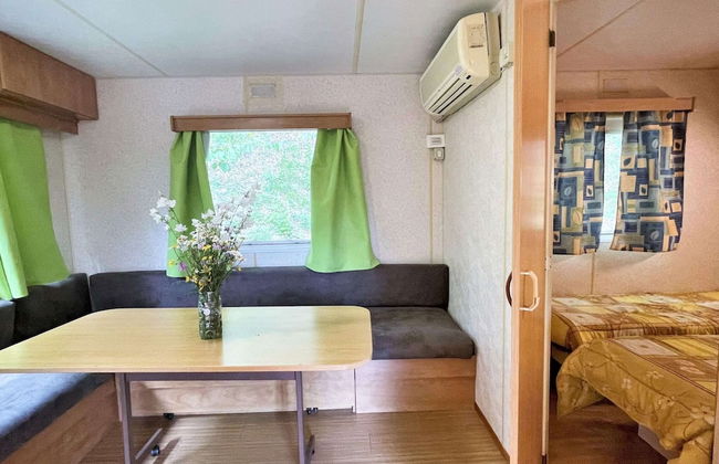 Pleasant Mobile Home in Toscana With Shared Pool - Photo 10