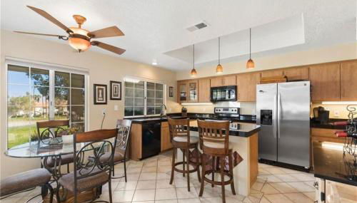 Muirfield House in Desert Falls CC - Foto 5, stove, dishwasher