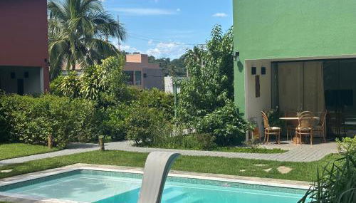 Casas aconchegantes com piscina na encantadora Praia das Cigarras - Foto 2, Garden, Garden view