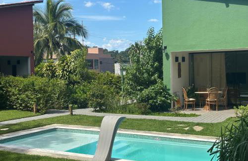 Casas aconchegantes com piscina na encantadora Praia das Cigarras - Foto 2