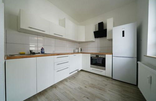 Schöne helle 50qm Suite mit großer Küche - Foto 12