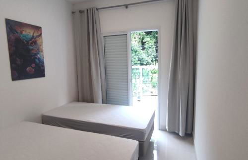 Apartamento novo a 350 m da praia das Toninhas em Ubatuba - 2 dormitórios sendo 1 suite, piscina, varanda gourmet com churrasqueira, ar condicionado, cozinha completa, garagem privativa - Foto 36