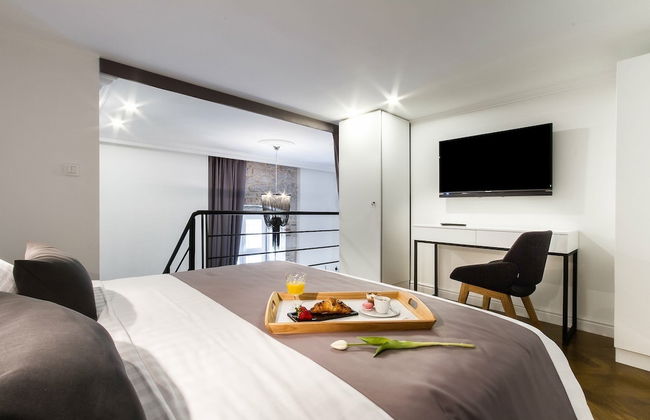 DeZign Apartments - Photo 16