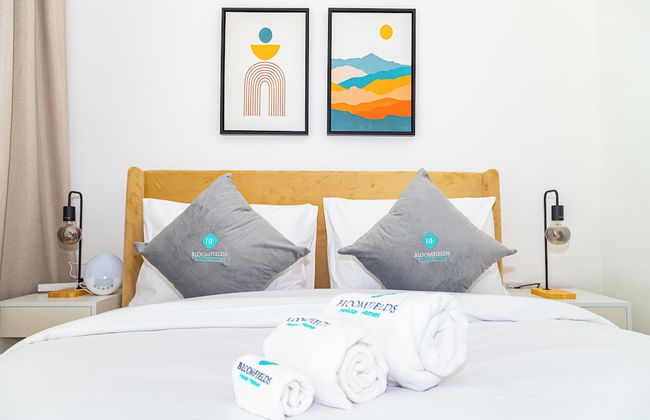 Bloomfields Spacious 2BR Duplex in Oasis - Photo 1