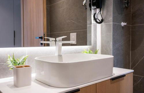 Unicos City Suites - Photo 65