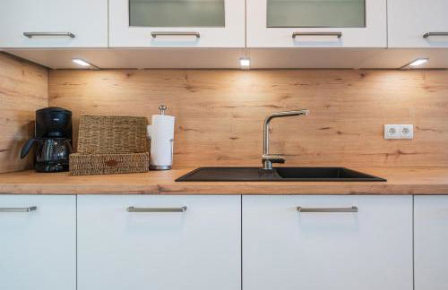 Hygge – Familienfreundliche Ferienwohnung mit Garten & Meerblick - Foto 21