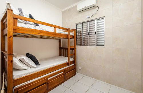 Casa confortável para Famílias e Grupos com Ar-condicionado em Praia Grande - Foto 22