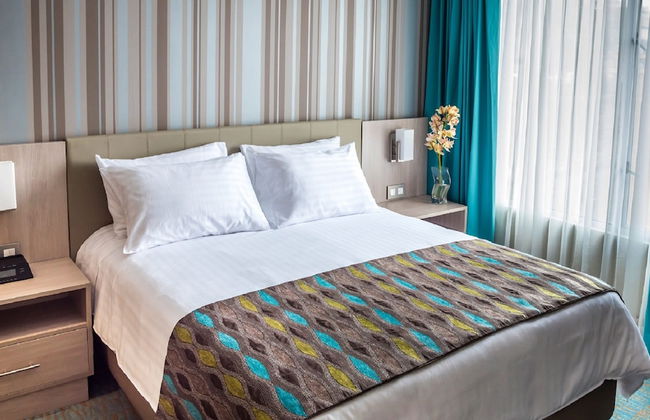 Hotel Plaza Suites - Photo 2