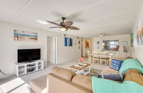 Coastal Condo Escape with Patio Steps to Beach - Photo 3