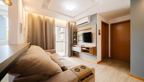 Aconchego e privacidade para sua família com 2 quartos, sala e cozinha integrados e sacada com churrasqueira - Foto 4