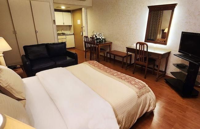 Holiday Home Suites - Foto 10