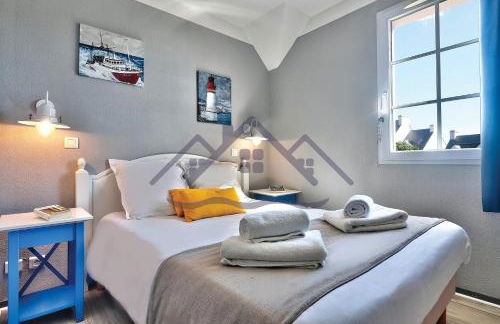 LocaLise - Maison E2 au Guilvinec - A 20m de la mer avec jardin et piscine - Tout à pied, plage, port, centre commerces, marché - Wifi inclus - Vue mer de la chambre - Animaux bienvenus - Linge de lit inclus - Foto 17