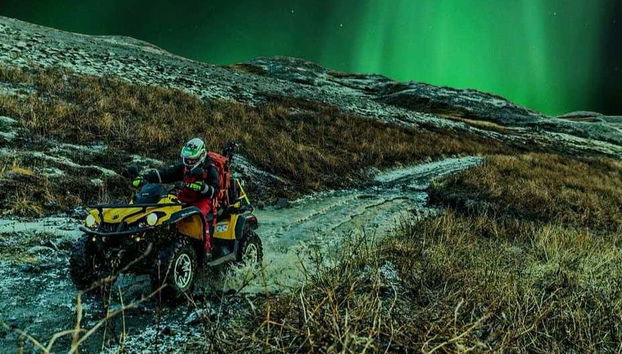 Quad biking under the Northern Lights