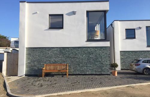 Relax in style at my stunning Holywell Beach home - Foto 13