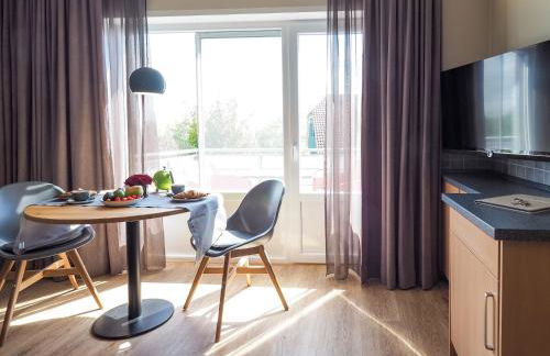 Antares Spiekerooger Gästehaus-Sonnengartenbalkon SüdWest - Wohnung 4 - Foto 8