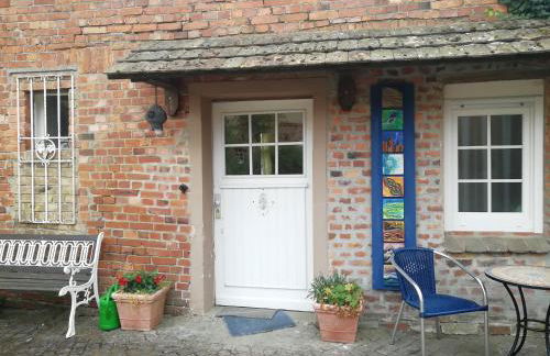 Ehemalige Bibliothek Apartment für 2 mit Küche Kamin Netflix Parken und Hofladen - Foto 1