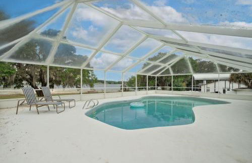 Sunny Lakeside Retreat with Pool and Firepit - Photo 3