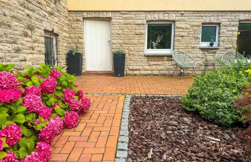 Souterrain Apartment mit eigenem Eingang und Terasse - Foto 26