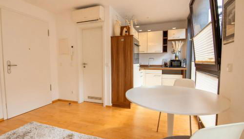 Exklusive 1-Zimmer-Wohnung in KA-Stadt - Foto 3, stove, minibar