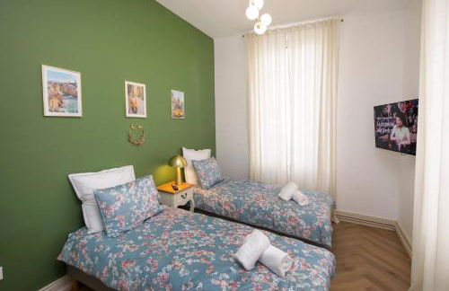 LE LYNX HAUSSMANIEN appartement tout confort, climatisé avec parking privé, à deux pas du centre - Foto 31