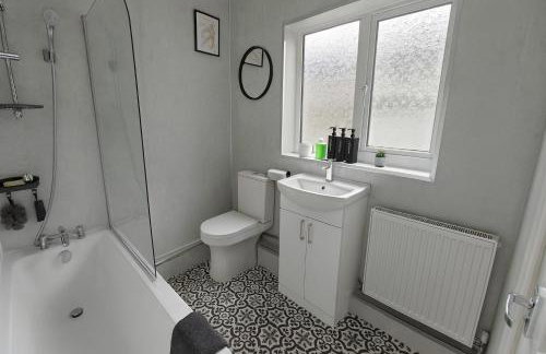 Coastal Haven - Steps From Beach - Photo 10