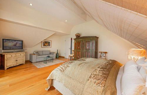 Wellness-Oase mit Wasserblick, Pool, Sauna & Fitnessbereich - Foto 14