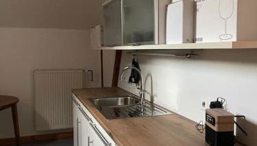 Mosel-Charm - Urige Dachgeschosswohnung für 6 Personen - 3 Schlafzimmer, Fahrradkeller & Gratis WLAN - BG Living & Hosting - Foto 4, stove, pet friendly