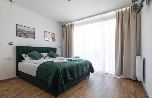 SOLEK, Apartamenty hotelowe i pokoje gościnne ze śniadaniem, przyjazne zwierzętom, wyjątkowe, z widokiem na Jezioro Jamno i w bardzo bliskiej odległości od morza - Foto 80